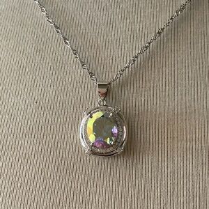 New in box necklace. Delicate silver chain with simulated fire opal m